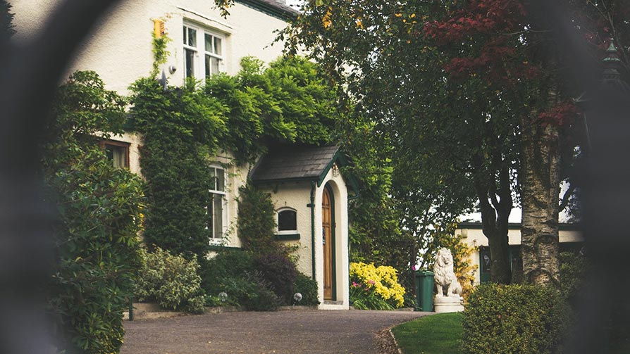 Country house front door entrance with a porch 