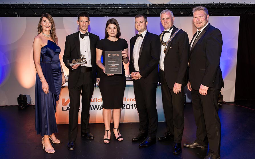 Winners on stage at the LABC East Midlands Building Excellence Awards 2019