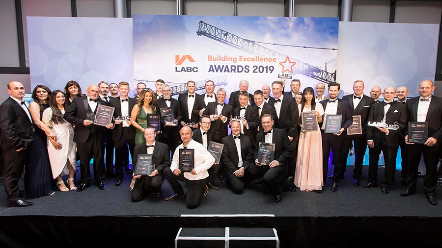 Winners on stage at the LABC North West Building Excellence Awards 2019