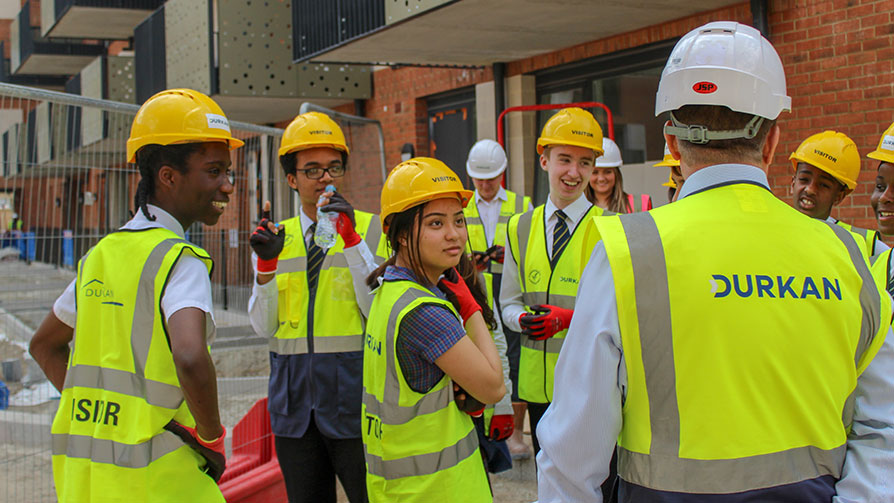 Young people learning on a construction site - Construction Youth Trust Young people learning on a construction site - Construction Youth Trust