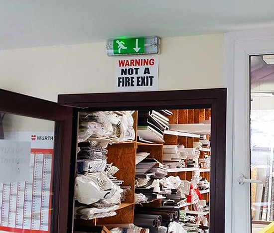 Warning - not a fire exit - confusing fire signage