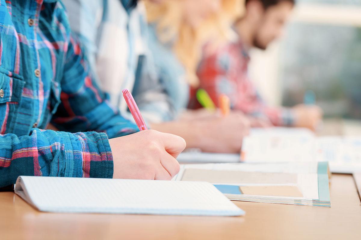 Cropped view of learners taking a CPD exam