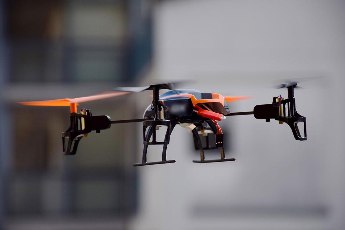 Drone in an urban environment used to conduct a building survey