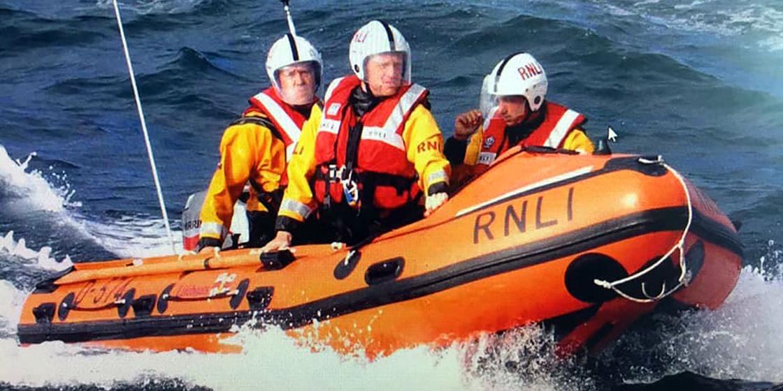 Guy Cooper at seat with the RNLI
