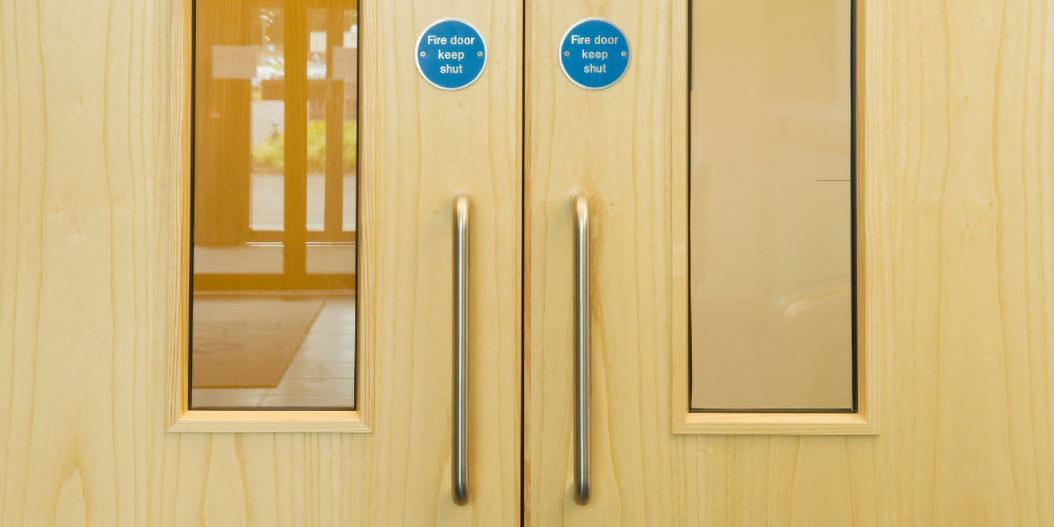 Fire doors with blue signs - Fire door keep shut