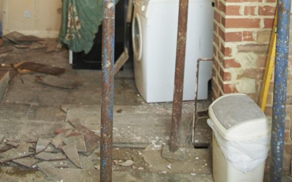 Image of flood damaged floor undergoing repairs