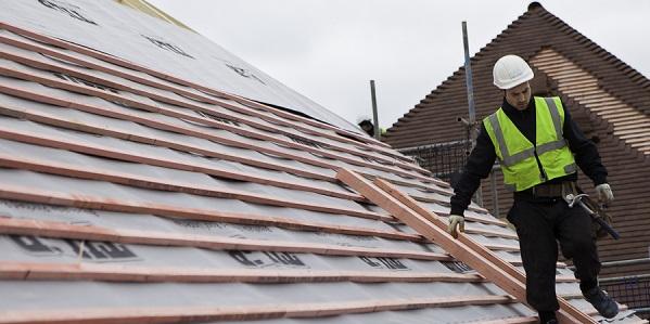 Picture of roofer on roof 