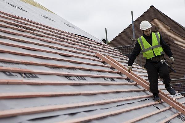 Picture of roofer on roof
