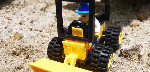 Toy digger in a sand pit - Open Doors 2018 inspiring the next generation
