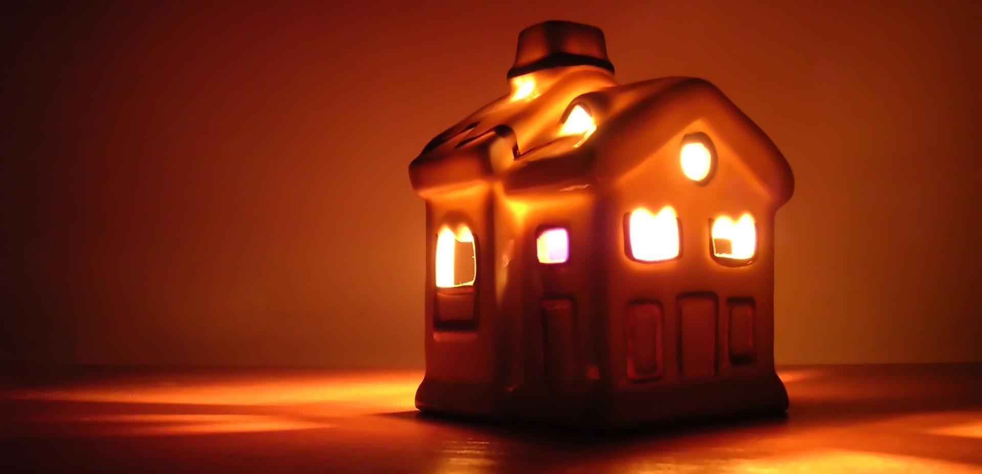 Picture of house with candle