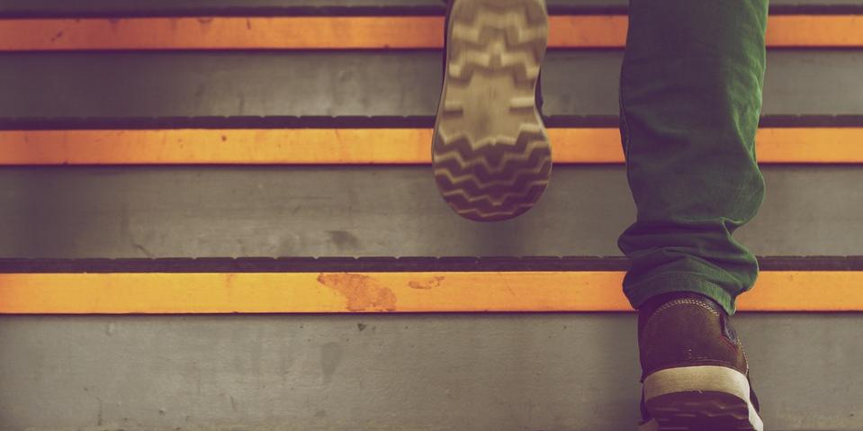 Picture of a stairway with someone walking up