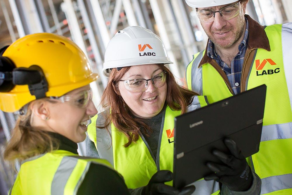 LABC building control team discussing work on site