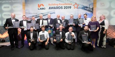 Winners on stage at the LABC South West Building Excellence Awards 2019
