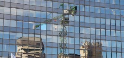 Reflection of crane in glass - the CLC roadmap to recovery 