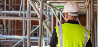 Builder or building control surveyor on a construction site