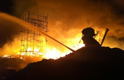 Image of a fireman fighting a fire