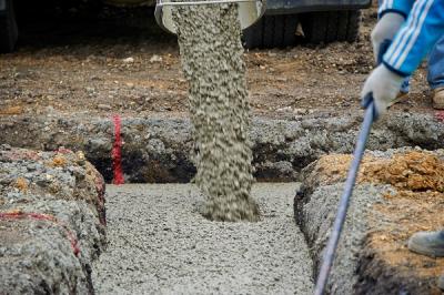 Picture of workman working with cement