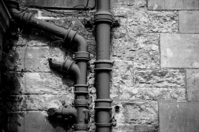 Picture of drainage pipework on wall