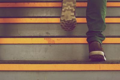 Picture of a stairway with someone walking up