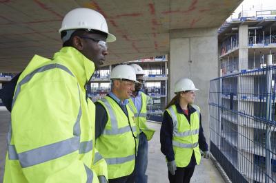 What is a building control officer? Picture showing four building control officers.