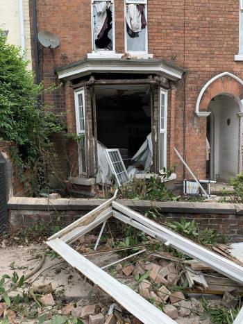 dangerous structures flat with broken wall and windows